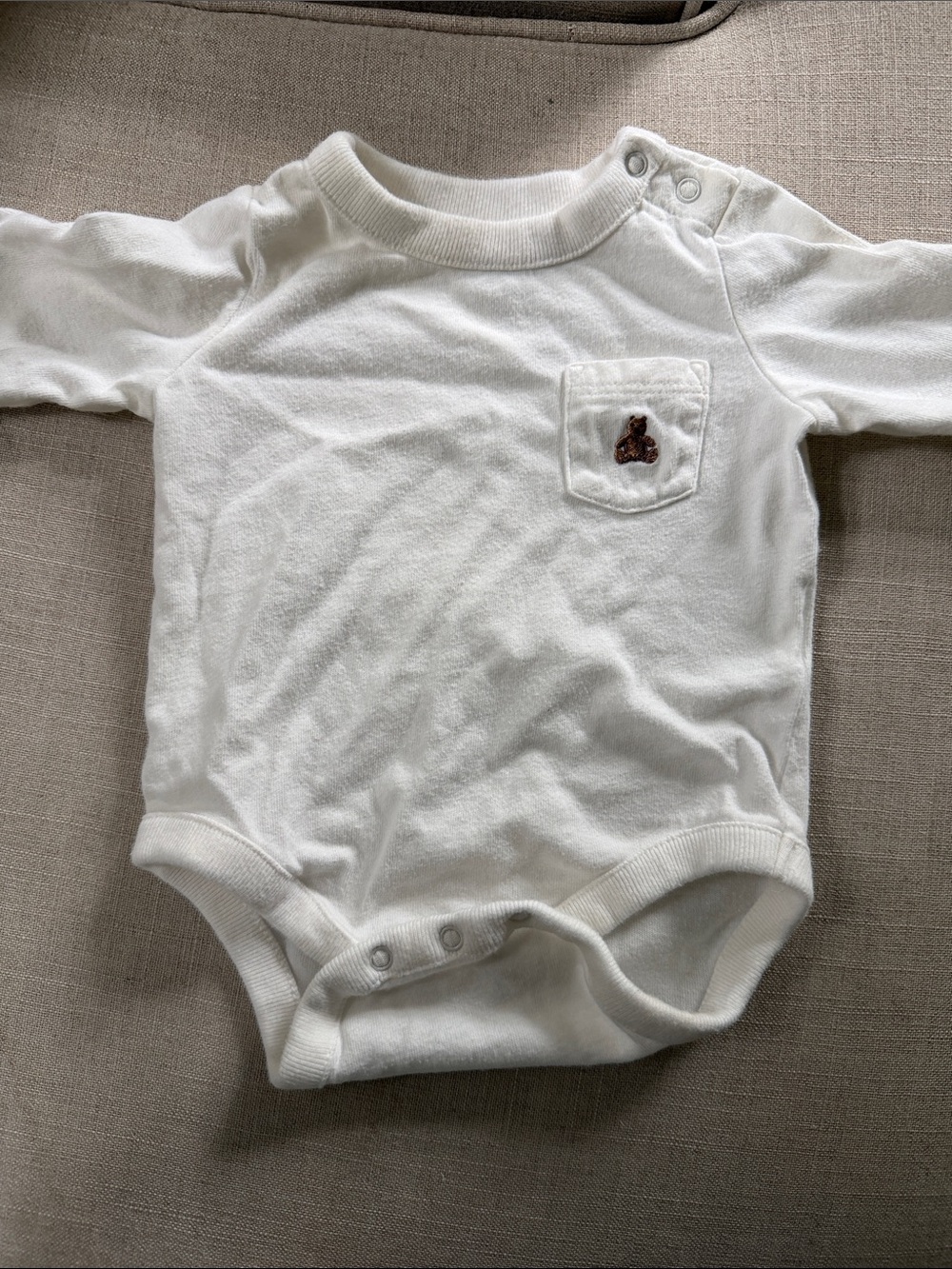 GAP White Long-Sleeve Baby Bodysuit with Pocket Bear Accent